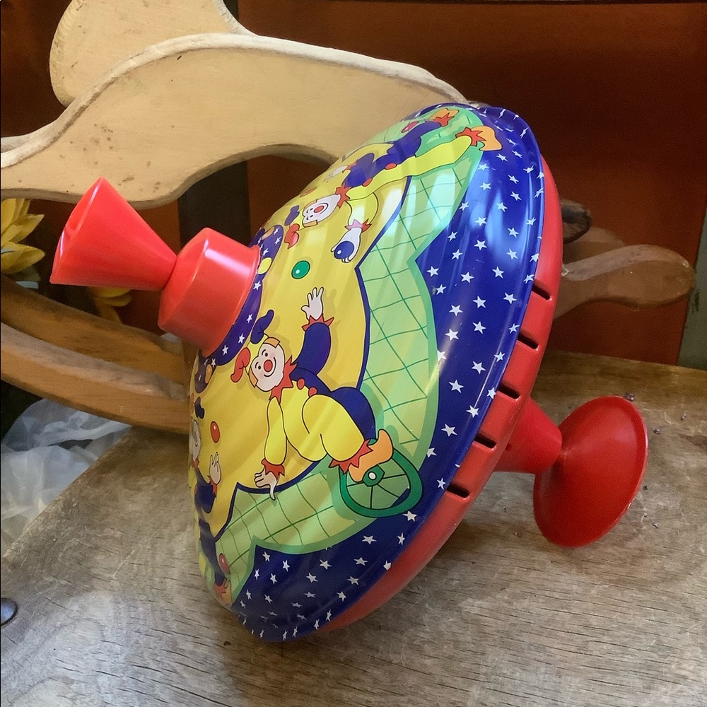 Clown Spinning Tin Top by Schylling